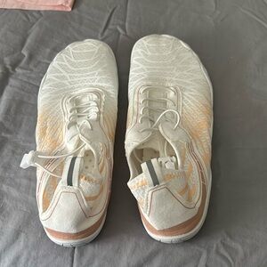 Comfortable white slip on shoes.